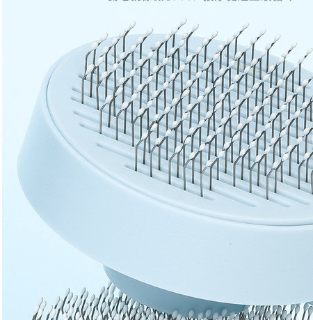 Kerge puhastusfunktsiooniga ümmargune hari kassidele