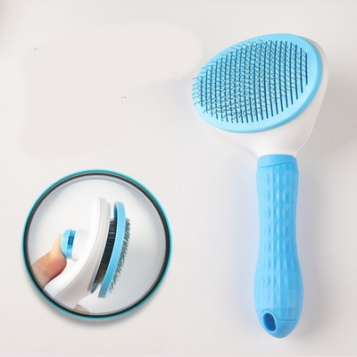 Kasside kammimise pintsel, millel on nööp karvade eemaldamiseks