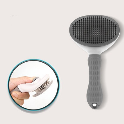 Kasside kammimise pintsel, millel on nööp karvade eemaldamiseks