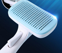 Perie pentru pieptănarea pisicilor