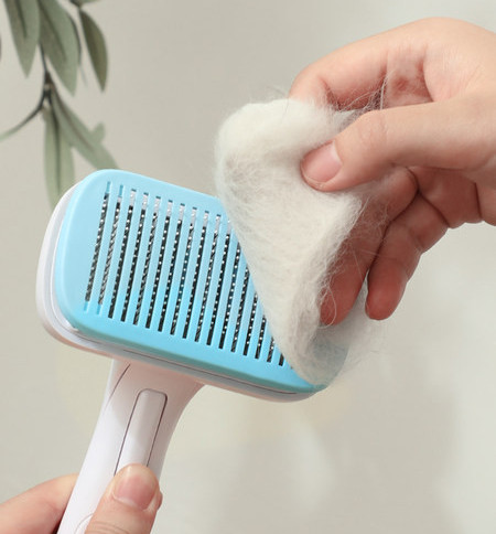 Perie pentru pieptănarea pisicilor