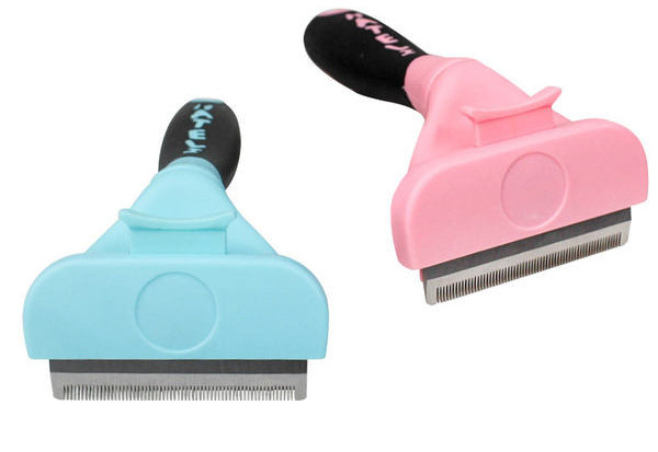 Pieptene din plastic pentru pieptănarea pisicilor