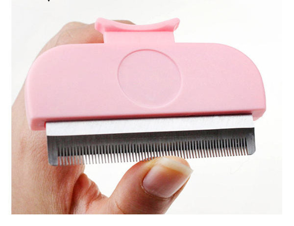 Pieptene din plastic pentru pieptănarea pisicilor