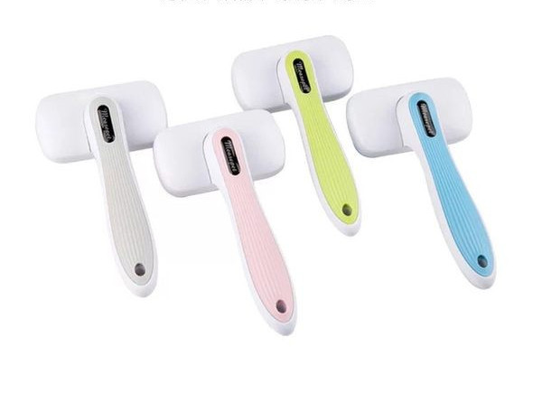 Pieptene de masaj pentru pisici