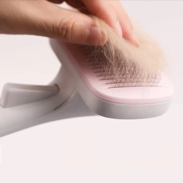 Pieptene de masaj pentru pisici