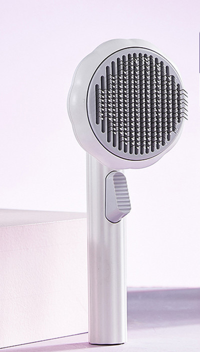 Perie pentru pisici pentru curățarea părului mort