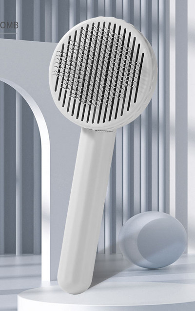 Pieptene rotund cu nasture pisica