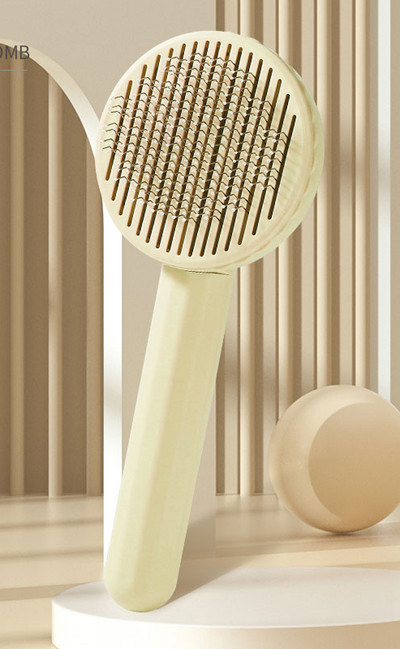 Pieptene rotund cu nasture pisica