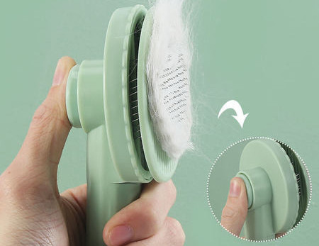 Pieptene rotund cu nasture pisica