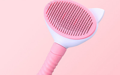 Perie pentru a îndepărta părul de pisică moartă