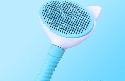 Perie pentru a îndepărta părul de pisică moartă