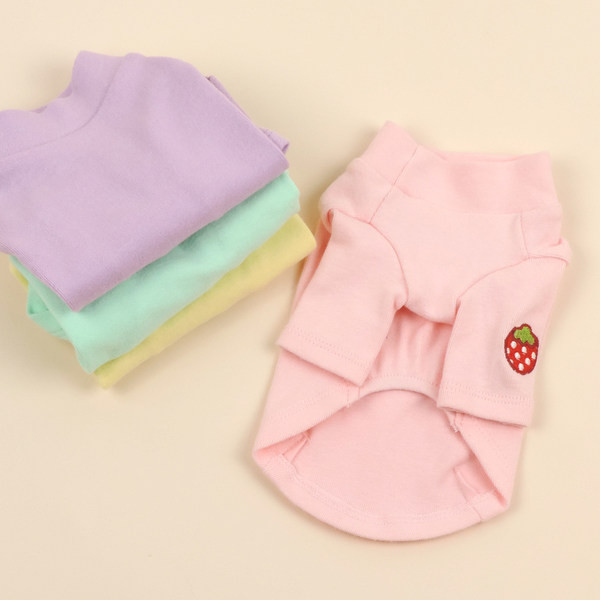 Mitmes värvitoonis tikandiga vest koertele