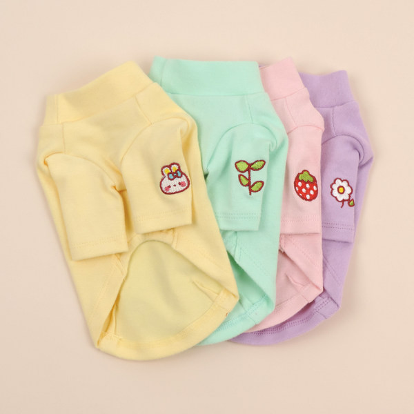 Mitmes värvitoonis tikandiga vest koertele