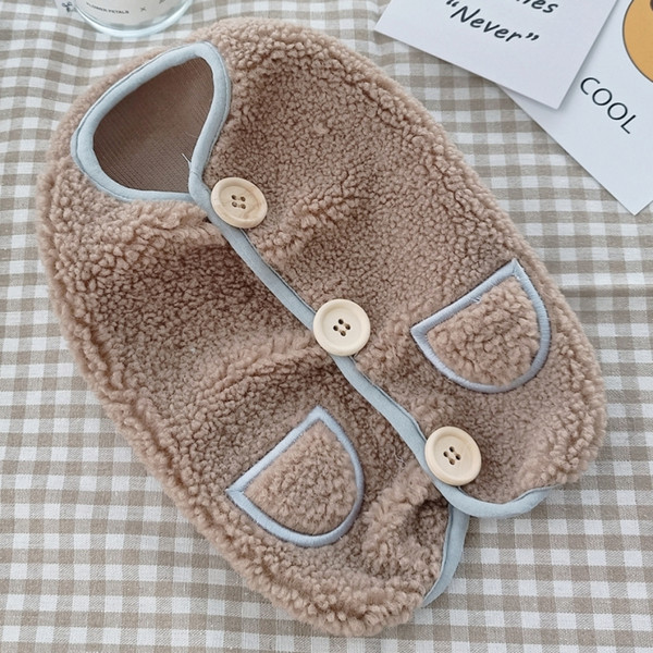 Sulevest koeranööpidega