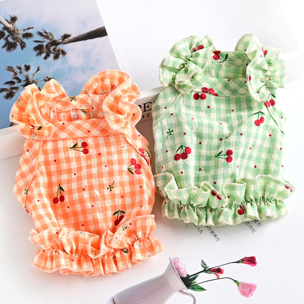 Tikandite ja lokkidega ruuduline kleit koertele