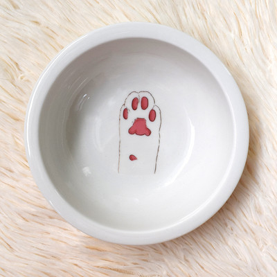 Ümmargune keraamiline kauss kassitoidu jaoks