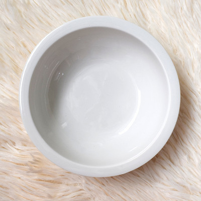 Ümmargune keraamiline kauss kassitoidu jaoks