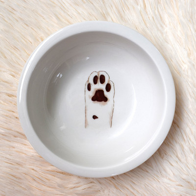 Ümmargune keraamiline kauss kassitoidu jaoks