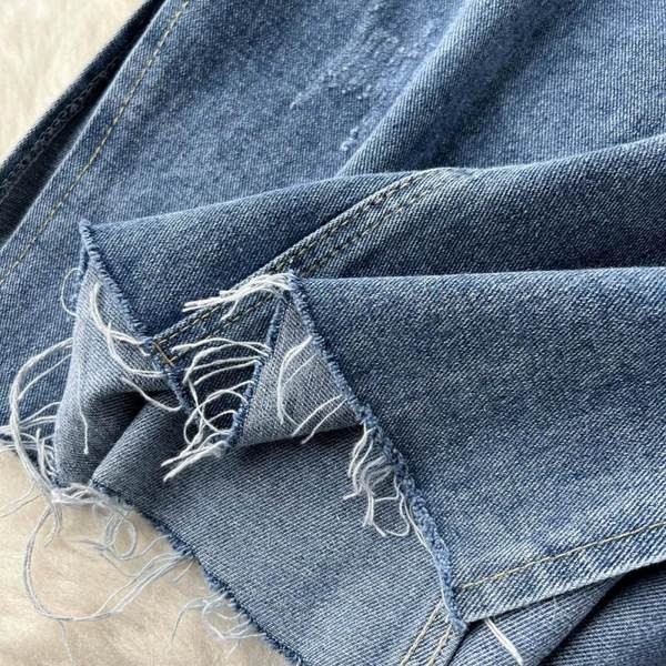 Pikk lõhikutega teksaseelik