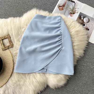 Ühevärviline kõrge vöökoha ja volditud osaga naiste seelik