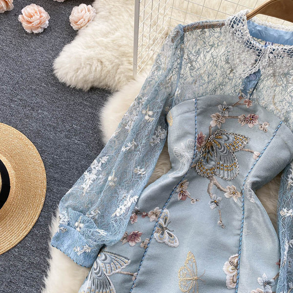 Naiste elegantne pitsi ja tikandiga kleit