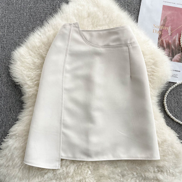 Asümmeetrilise mudeli kõrge vöökohaga naiste seelik