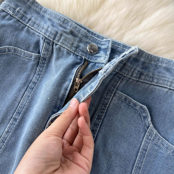 Pikk teksaseelik taskute ja tülliga