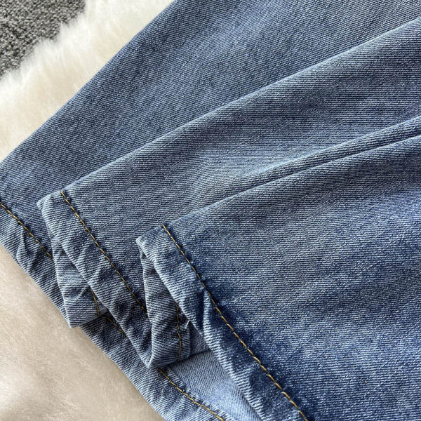 Naiste teksakleit kummiku ja taskutega