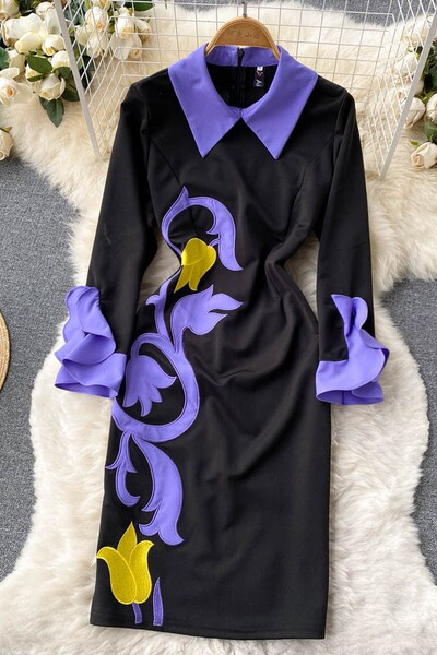 Klassikalise kraega naiste kleit, mille varrukas on lokid