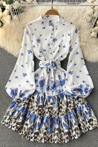 Naiste šifoonist kleit ovaalse kaelusega ja lillemotiiviga