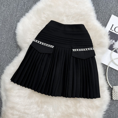 Naiste plisseeritud seelik kõrge vöökoha ja dekoratiivkividega