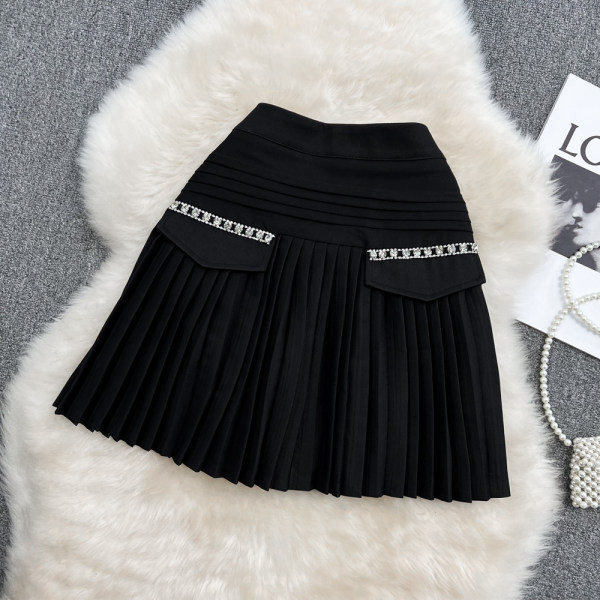 Naiste plisseeritud seelik kõrge vöökoha ja dekoratiivkividega