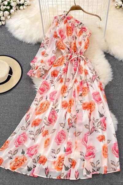 Lillemustri ja ühe varrukaga naiste kleit