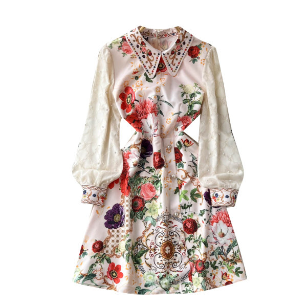 Lillemustri ja tikandiga naiste kleit