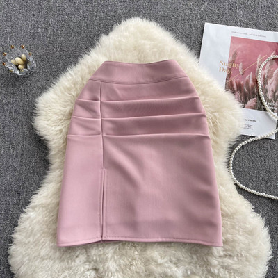 Naiste kõrge vöökoha ja lõhikuga seelik