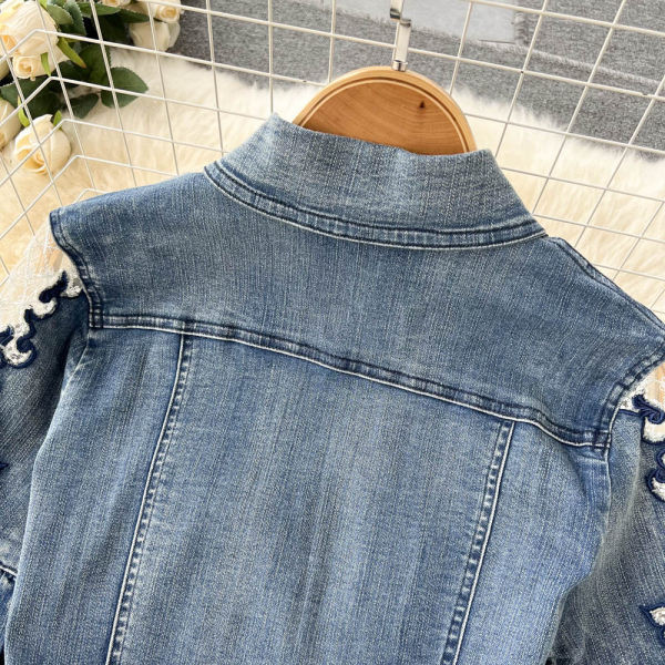 Naiste nööpidega teksakleit