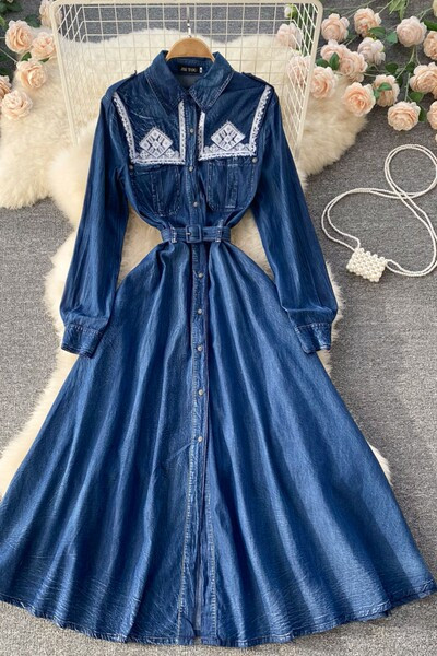 Pika lõikega tikandiga teksakleit