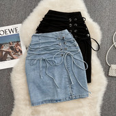 Naiste kõrge vöökoha ja lipsudega teksaseelik