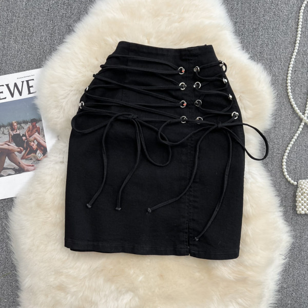 Naiste kõrge vöökoha ja lipsudega teksaseelik