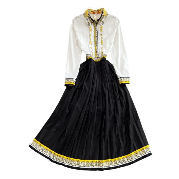 Moodne plisseeritud alaosa ja värvilise mustriga kevadkleit