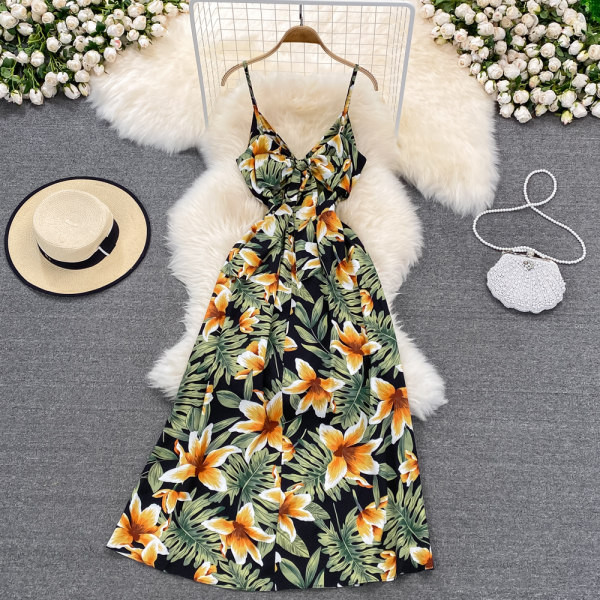 Uut mudelit õhukeste rihmade ja lillemustriga suvine naiste kleit