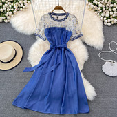 Pikk naiste kleit lühikeste varrukate ja tikanditega