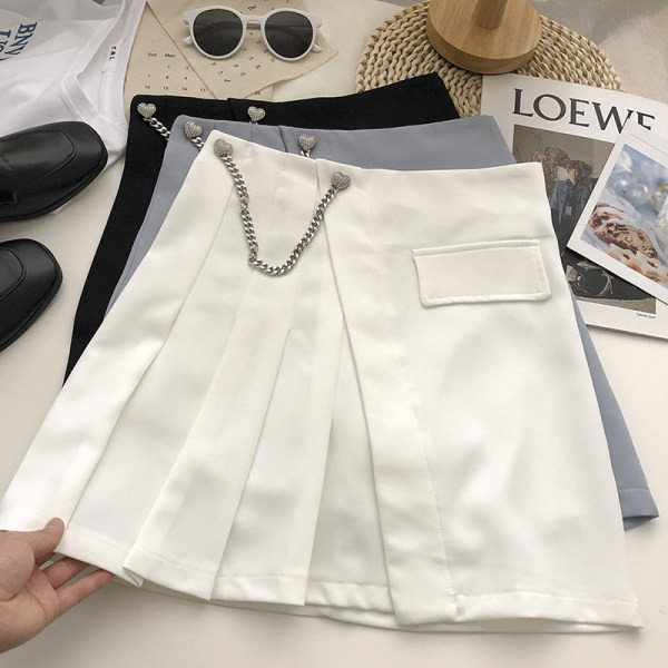 Naiste plisseeritud seelik kõrge vöökoha ja metallist kaunistusega