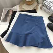 Kõrge vöökoha ja lokkidega kevadine naiste seelik