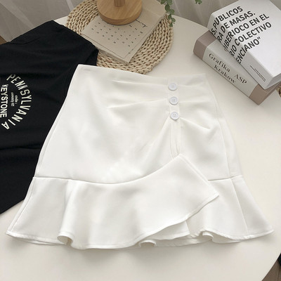 Kõrge vöökoha ja lokkidega kevadine naiste seelik