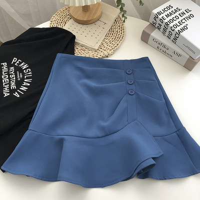 Kõrge vöökoha ja lokkidega kevadine naiste seelik