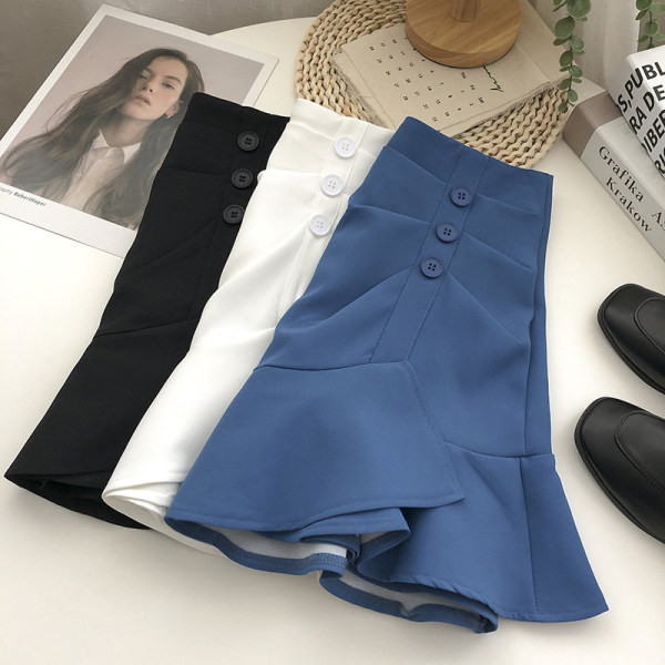 Kõrge vöökoha ja lokkidega kevadine naiste seelik