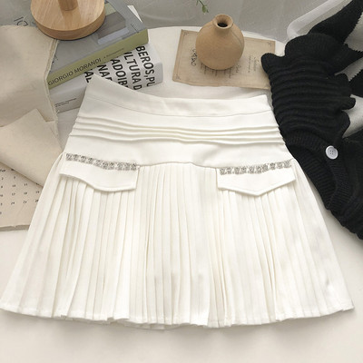 Sieviešu kroku svārki ar akmeņiem viduklī