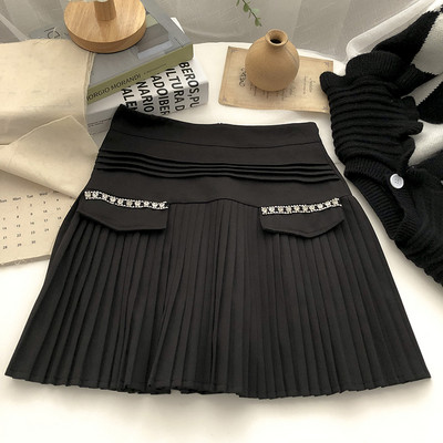 Sieviešu kroku svārki ar akmeņiem viduklī