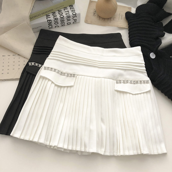 Sieviešu kroku svārki ar akmeņiem viduklī